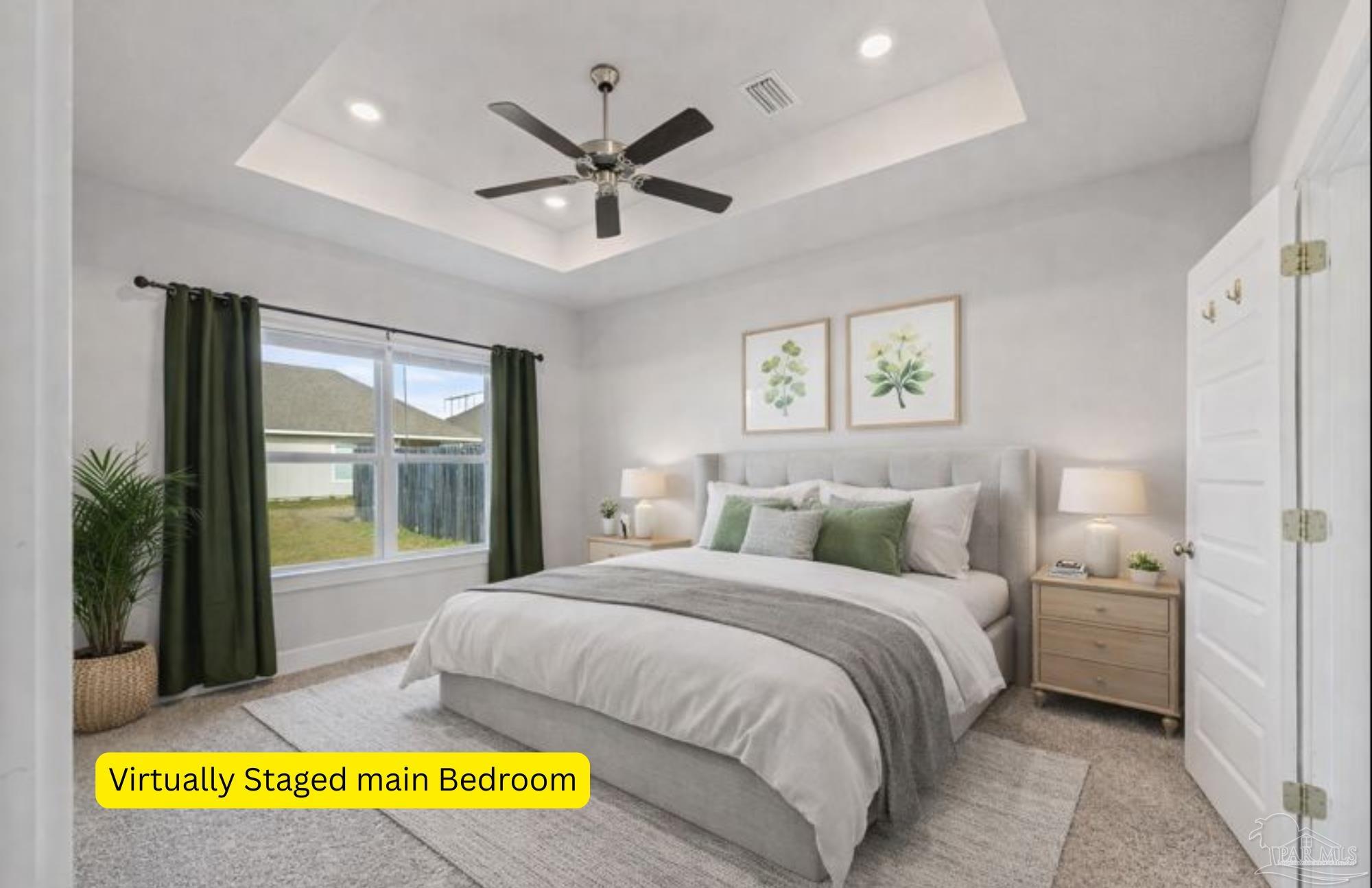 4074 Blaney Lane Pace, FL 32571 - Photo 17 of 59 a bedroom with a large bed and a chandelier