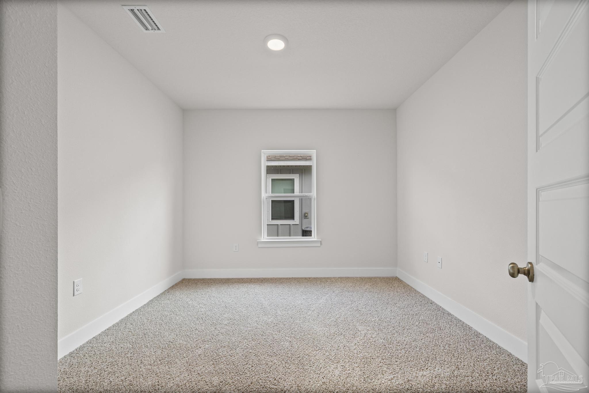 4074 Blaney Lane Pace, FL 32571 - Photo 34 of 59 a view of an empty room with a window