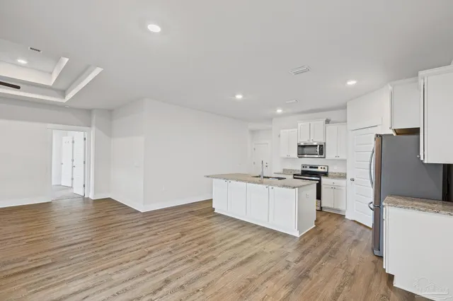 a view of swimming pool with outdoor seating