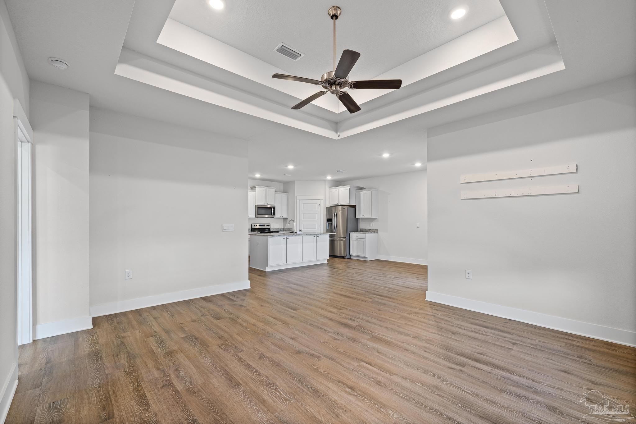 4074 Blaney Lane Pace, FL 32571 - Photo 47 of 59 a view of empty room with wooden floor