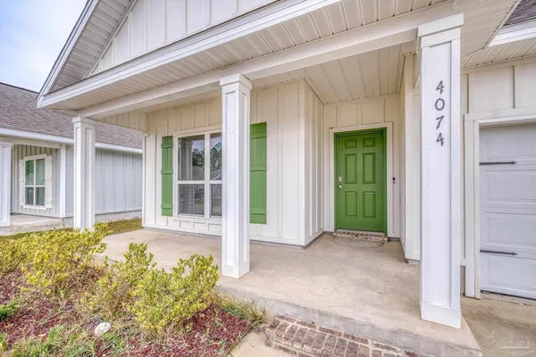 a front view of a house with yard