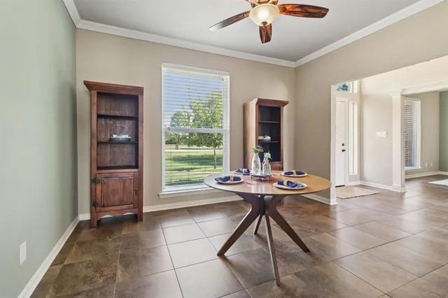 a table and chairs in a room