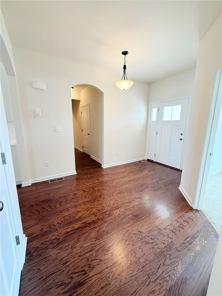 328 Abby Road, Unit LOT 15 Macungie, PA 18062 - Photo 5 of 26 Rich hardwood floors welcome guests into this freshly painted entryway.
