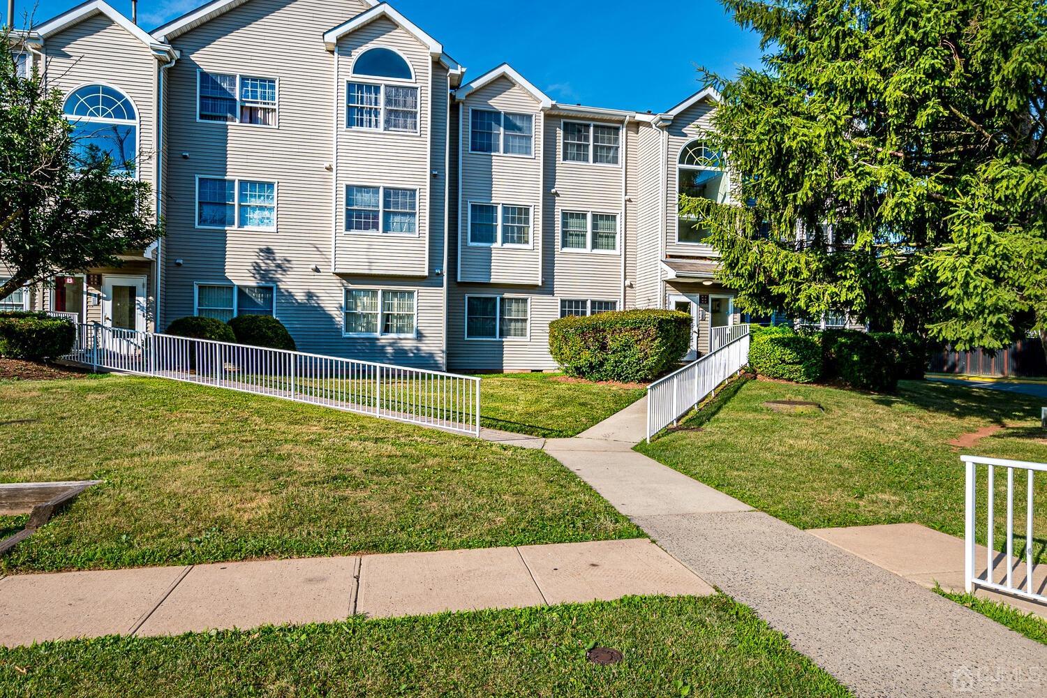 930 Edpas Road New Brunswick, NJ 08901 - Photo 2 of 13 a front view of a house with garden