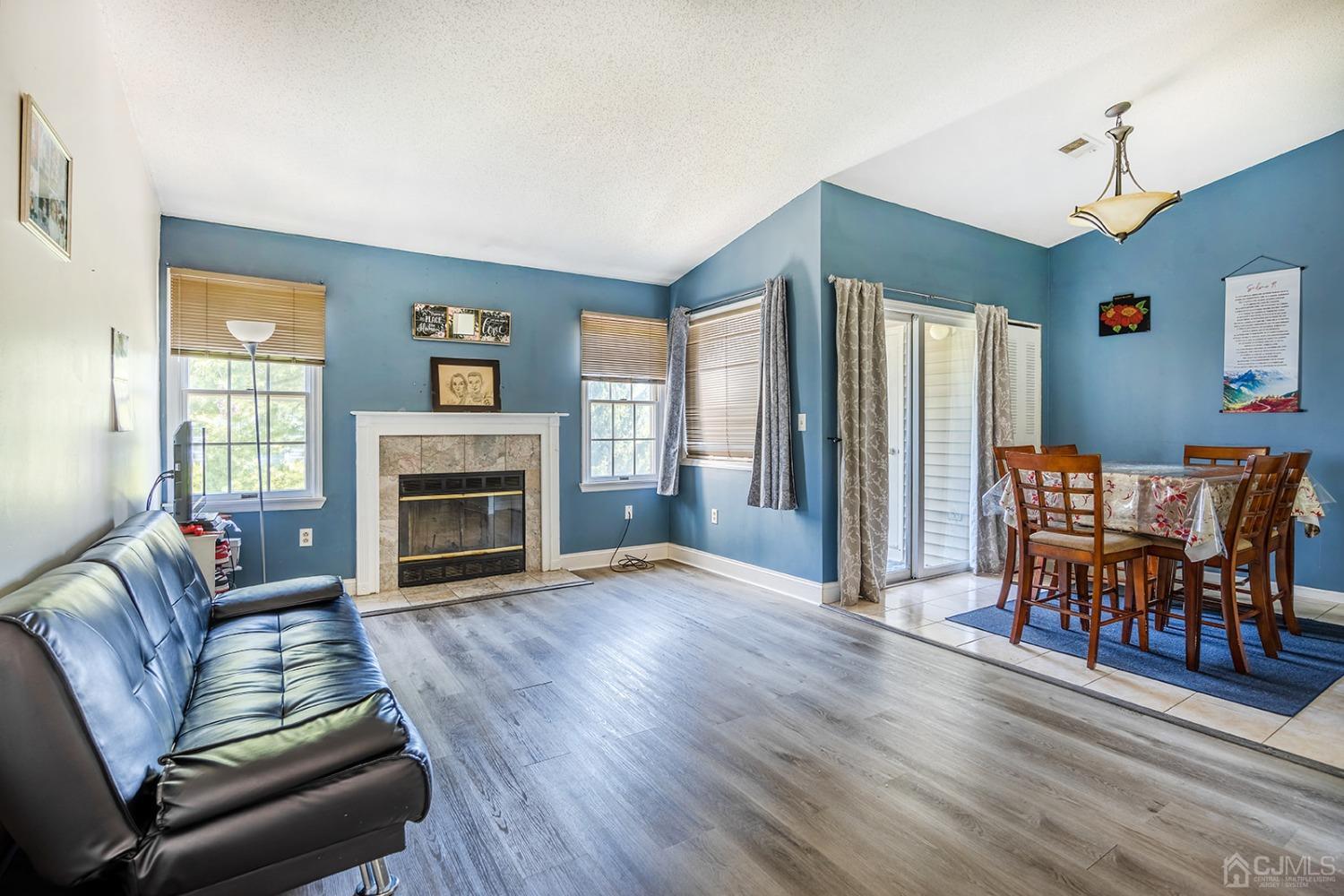 930 Edpas Road New Brunswick, NJ 08901 - Photo 7 of 13 a living room with furniture and a fireplace
