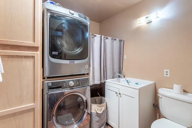 a utility room with dryer and washer
