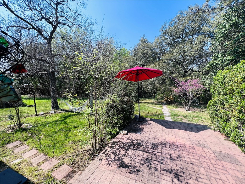 744 Wales Way Austin, TX 78748 - Photo 13 of 15 a view of a backyard with a patio
