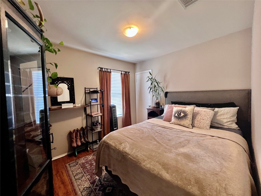 744 Wales Way Austin, TX 78748 - Photo 10 of 15 a bedroom with a bed and a dresser