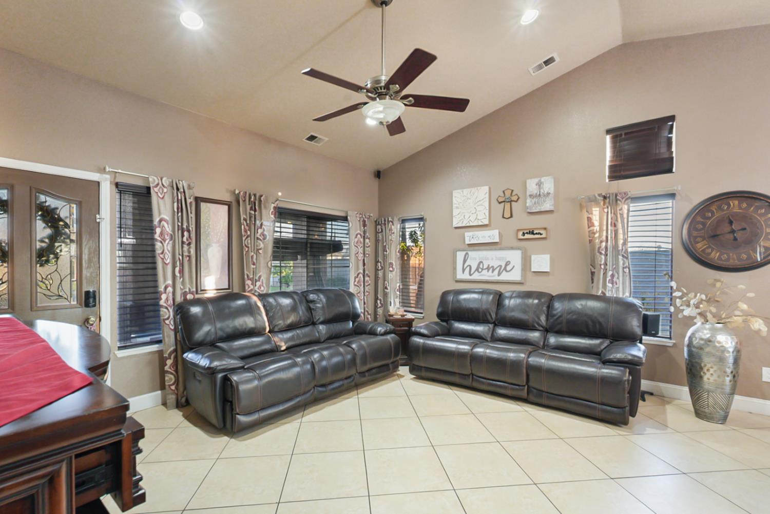 1421 Riverette Drive Modesto, CA 95351 - Photo 13 of 32 a living room with furniture and a large window