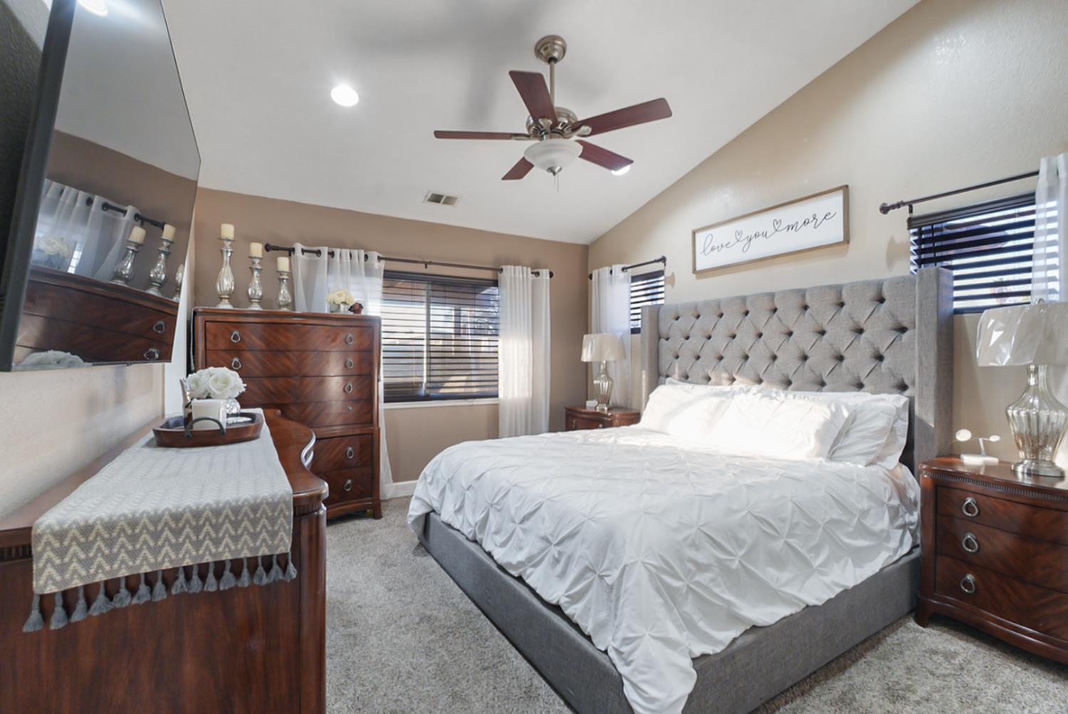 1421 Riverette Drive Modesto, CA 95351 - Photo 15 of 32 a bedroom with a bed and window