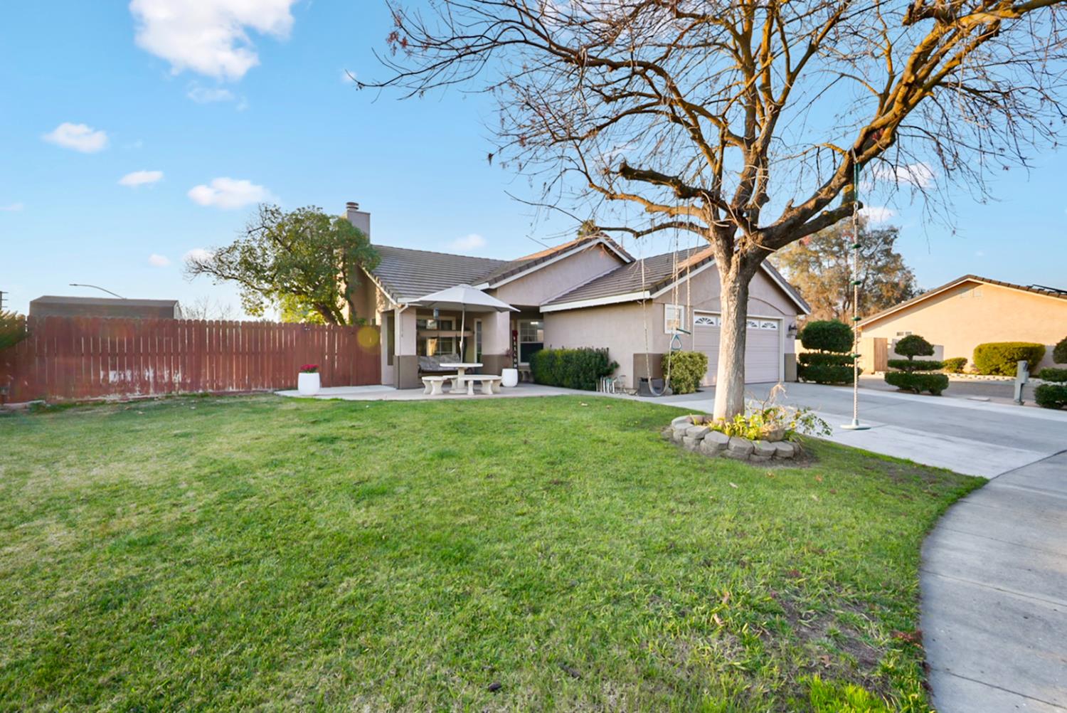 1421 Riverette Drive Modesto, CA 95351 - Photo 3 of 32 a view of house with backyard