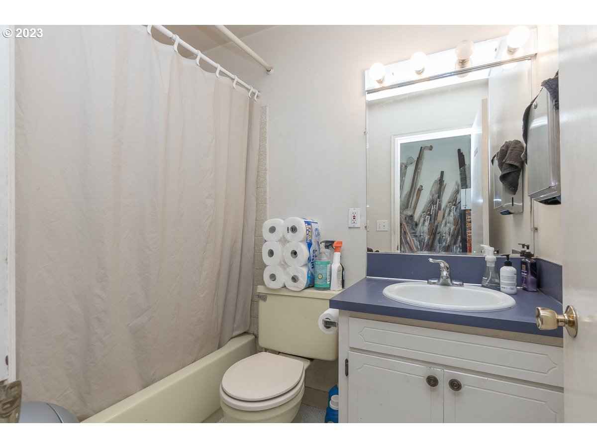 1326 Southwest 12th Avenue Portland, OR 97201 - Photo 20 of 33 a bathroom with a sink toilet and shower