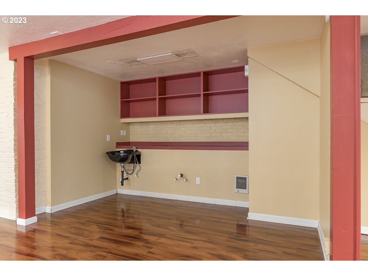 1326 Southwest 12th Avenue Portland, OR 97201 - Photo 24 of 33 a view of wooden floor in a room
