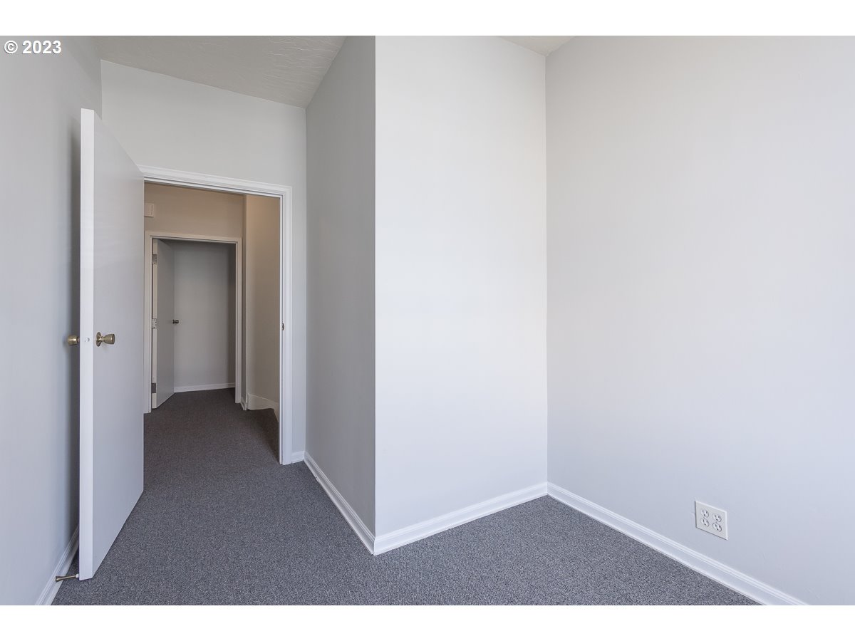 1326 Southwest 12th Avenue Portland, OR 97201 - Photo 33 of 33 a view of an empty room with closet and a window