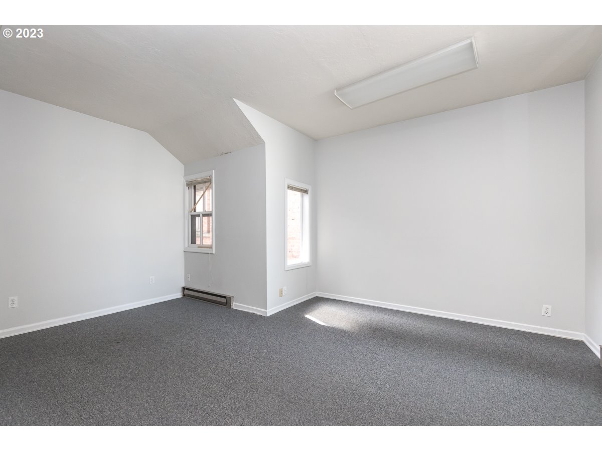 1326 Southwest 12th Avenue Portland, OR 97201 - Photo 4 of 33 a view of an empty room and window