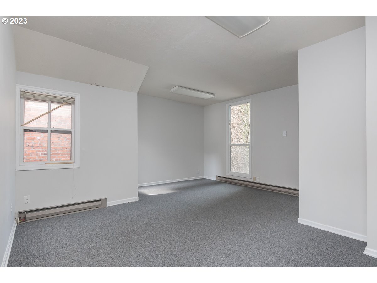 1326 Southwest 12th Avenue Portland, OR 97201 - Photo 6 of 33 a view of an empty room with a window