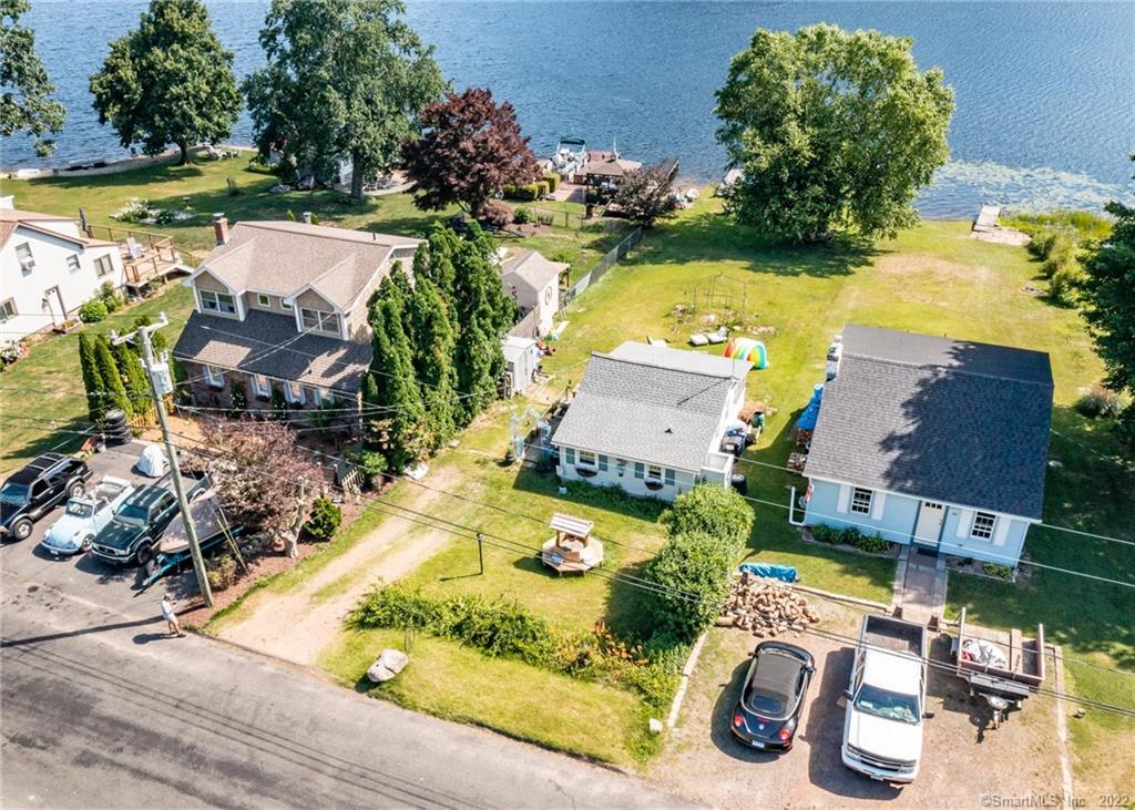 62 Lake Road Portland, CT 06480 - Photo 1 of 1 an aerial view of a house with a ocean view