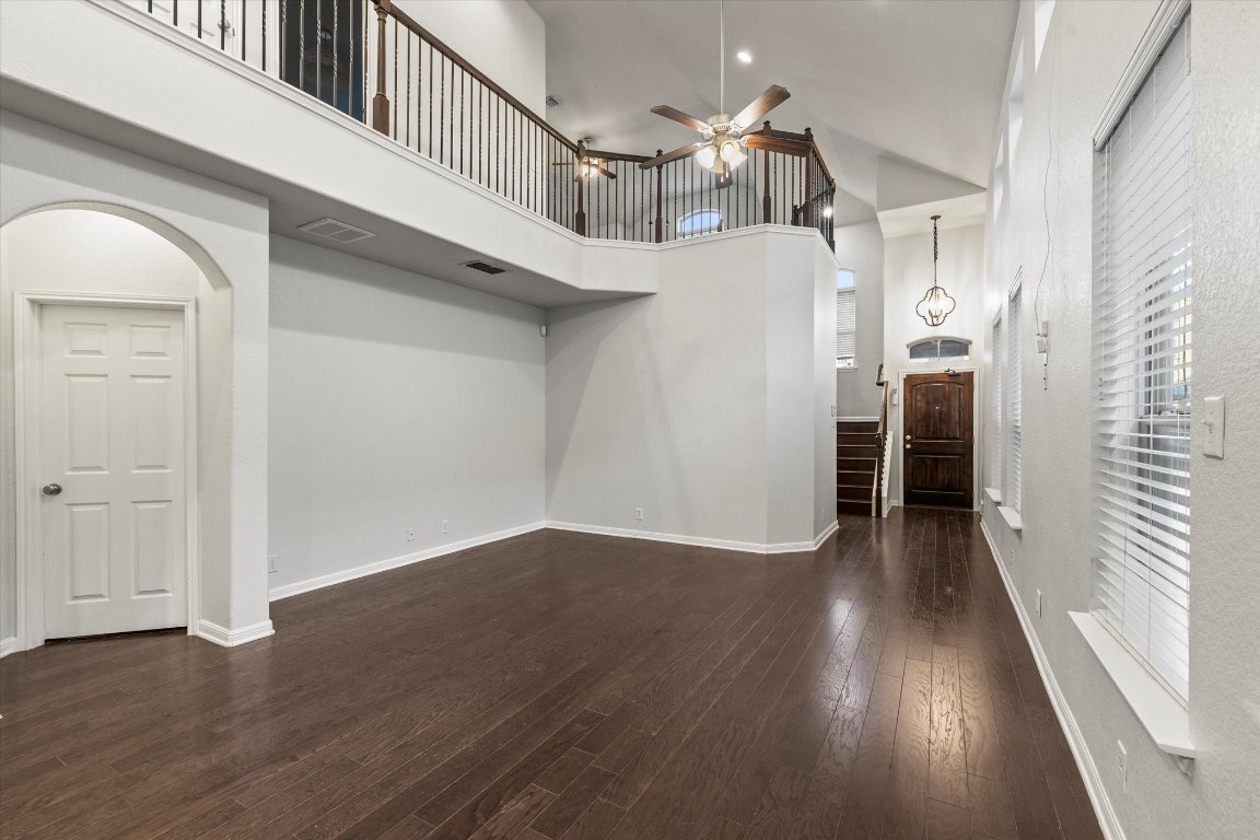 7337 Menchaca Road, Unit 22 Austin, TX 78745 - Photo 10 of 23 a view of entryway and hall with wooden floor