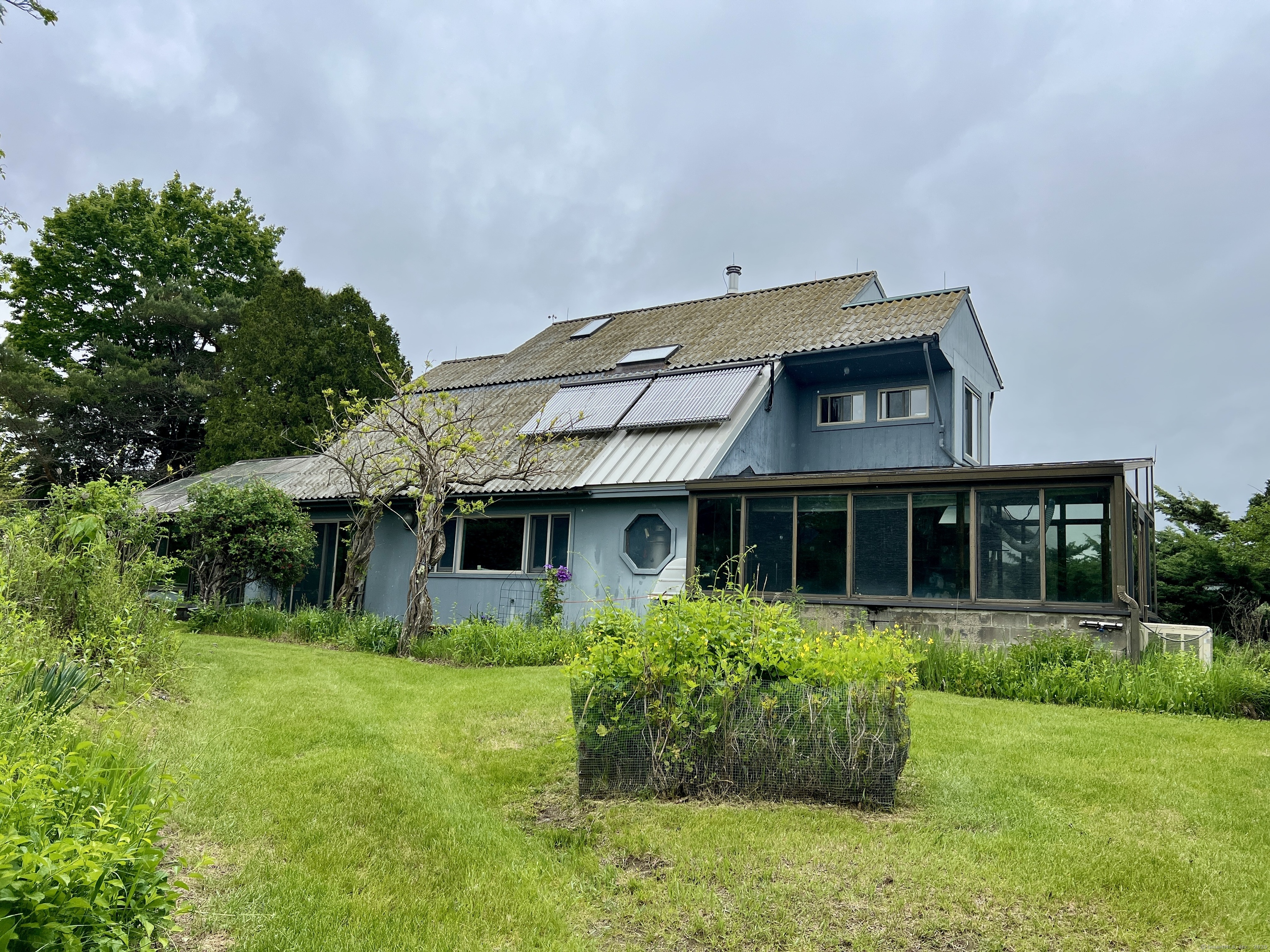 282 Farnum Road Salisbury, CT 06039 - Photo 11 of 22 front view of house with a yard