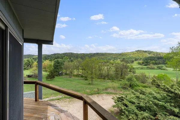 a view of a garden from a balcony