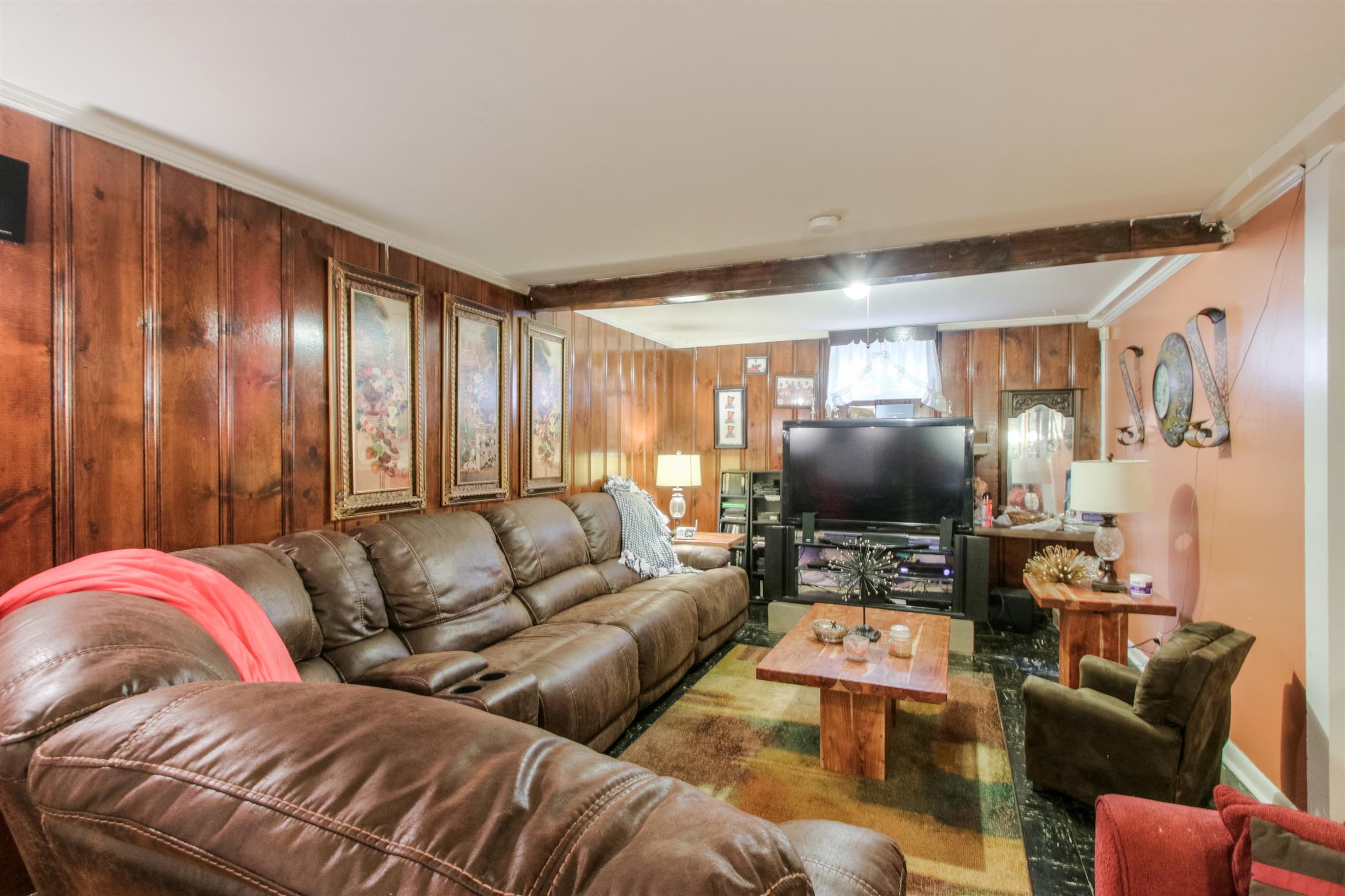 917 Mitchell Road Nashville, TN 37206 - Photo 15 of 19 a living room with furniture ceiling fan and a window