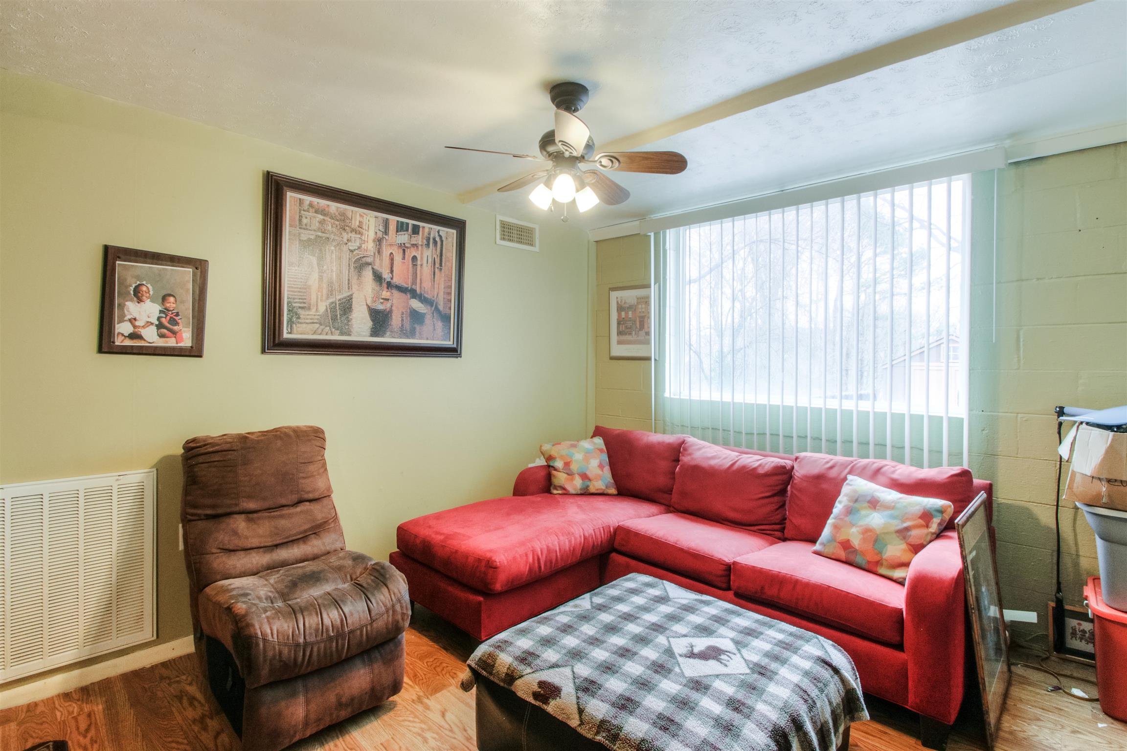 917 Mitchell Road Nashville, TN 37206 - Photo 18 of 19 a bedroom with furniture and a window