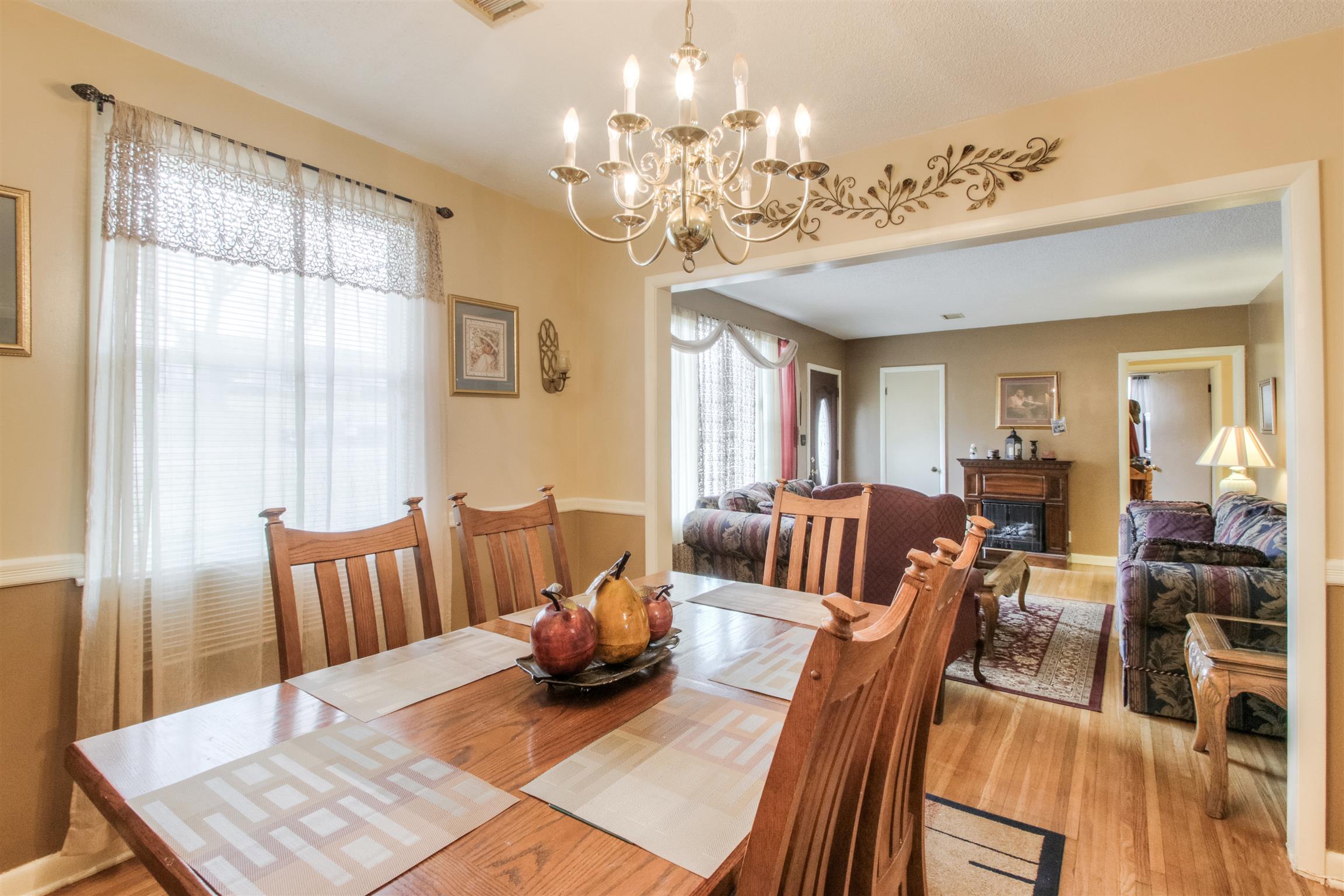917 Mitchell Road Nashville, TN 37206 - Photo 10 of 19 a living room with furniture and a chandelier