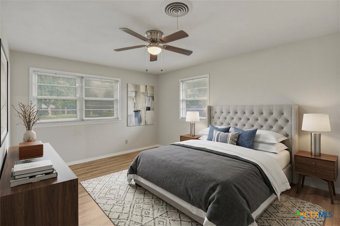 2410 Robin Road Temple, TX 76502 - Photo 17 of 22 BEDROOM 3 WITH ADJOINING BATH - virtually staged