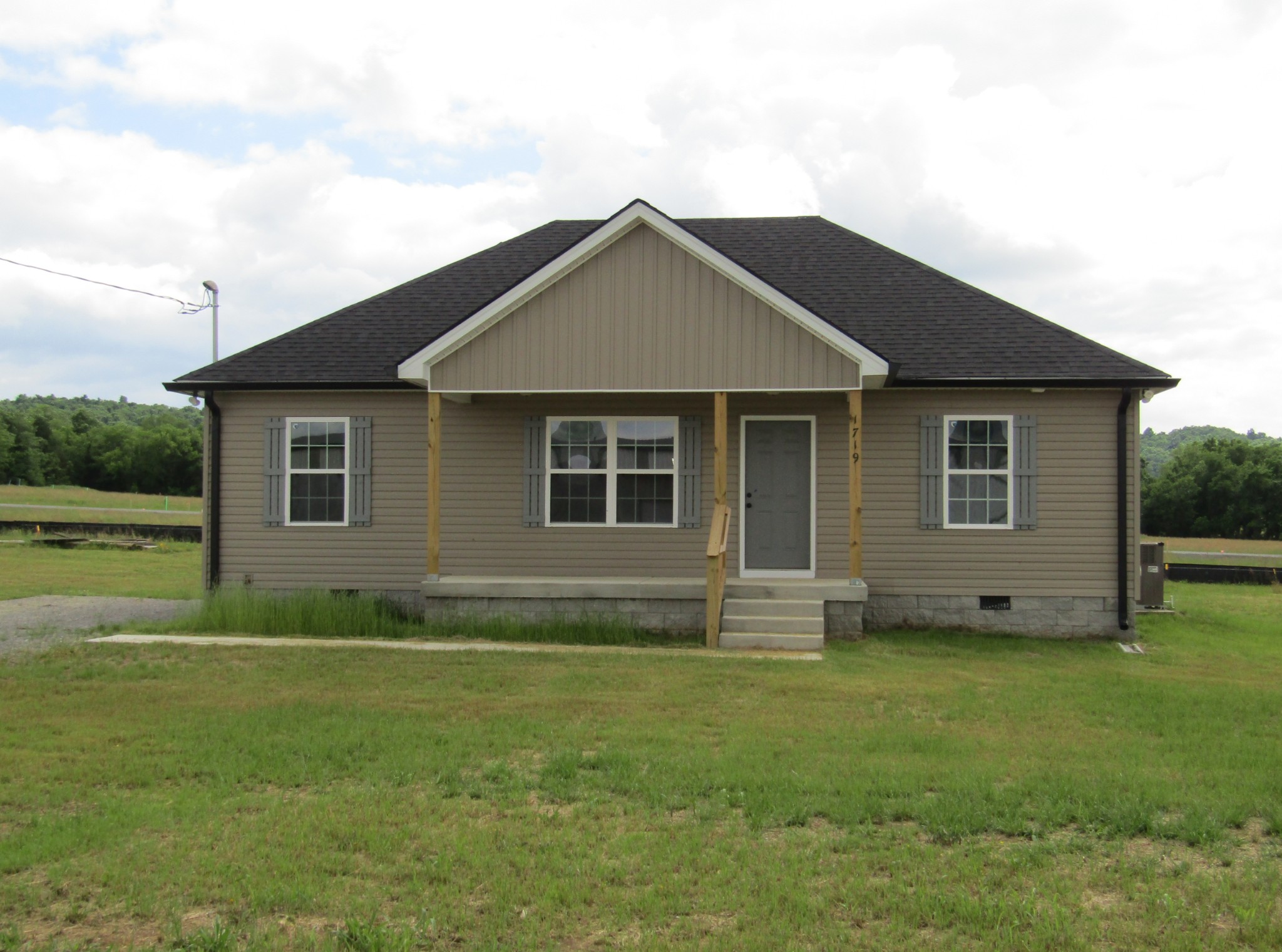 1719 Old Belfast Road Lewisburg, TN 37091 - Photo 1 of 14 a front view of a house with yard