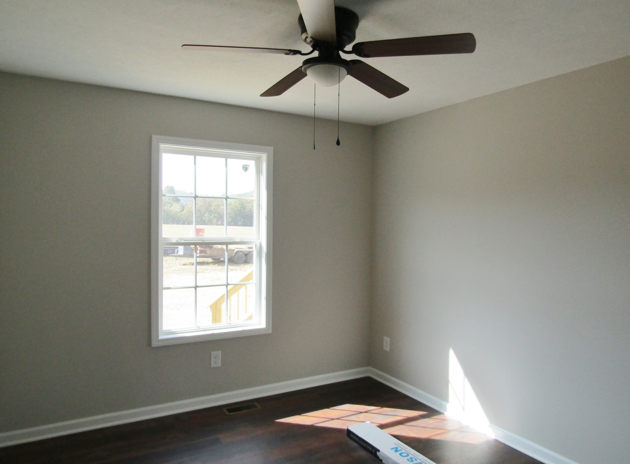 1719 Old Belfast Road Lewisburg, TN 37091 - Photo 12 of 14 an empty room with a window and a fan