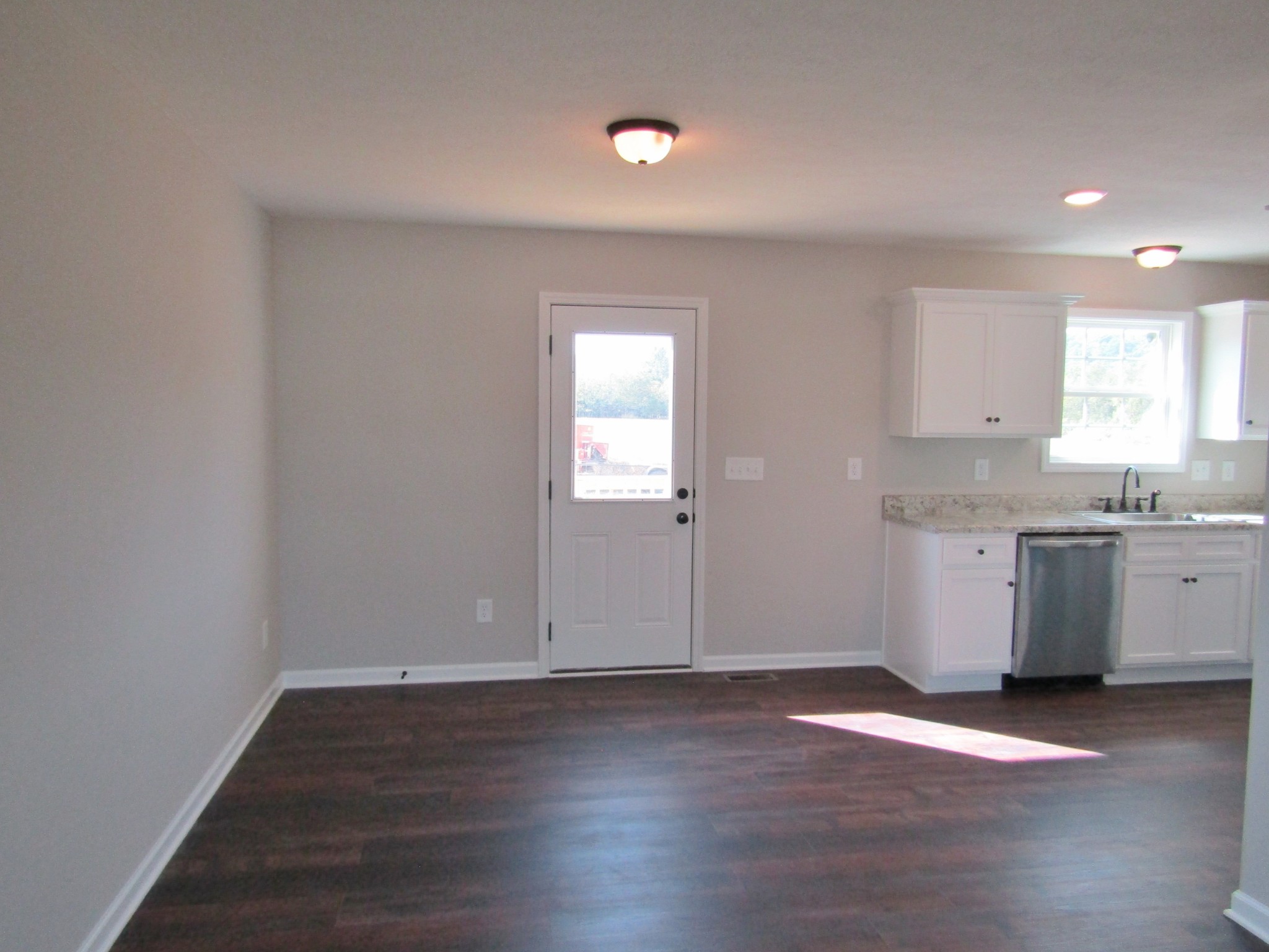 1719 Old Belfast Road Lewisburg, TN 37091 - Photo 4 of 14 a view of a kitchen with wooden floor and a sink