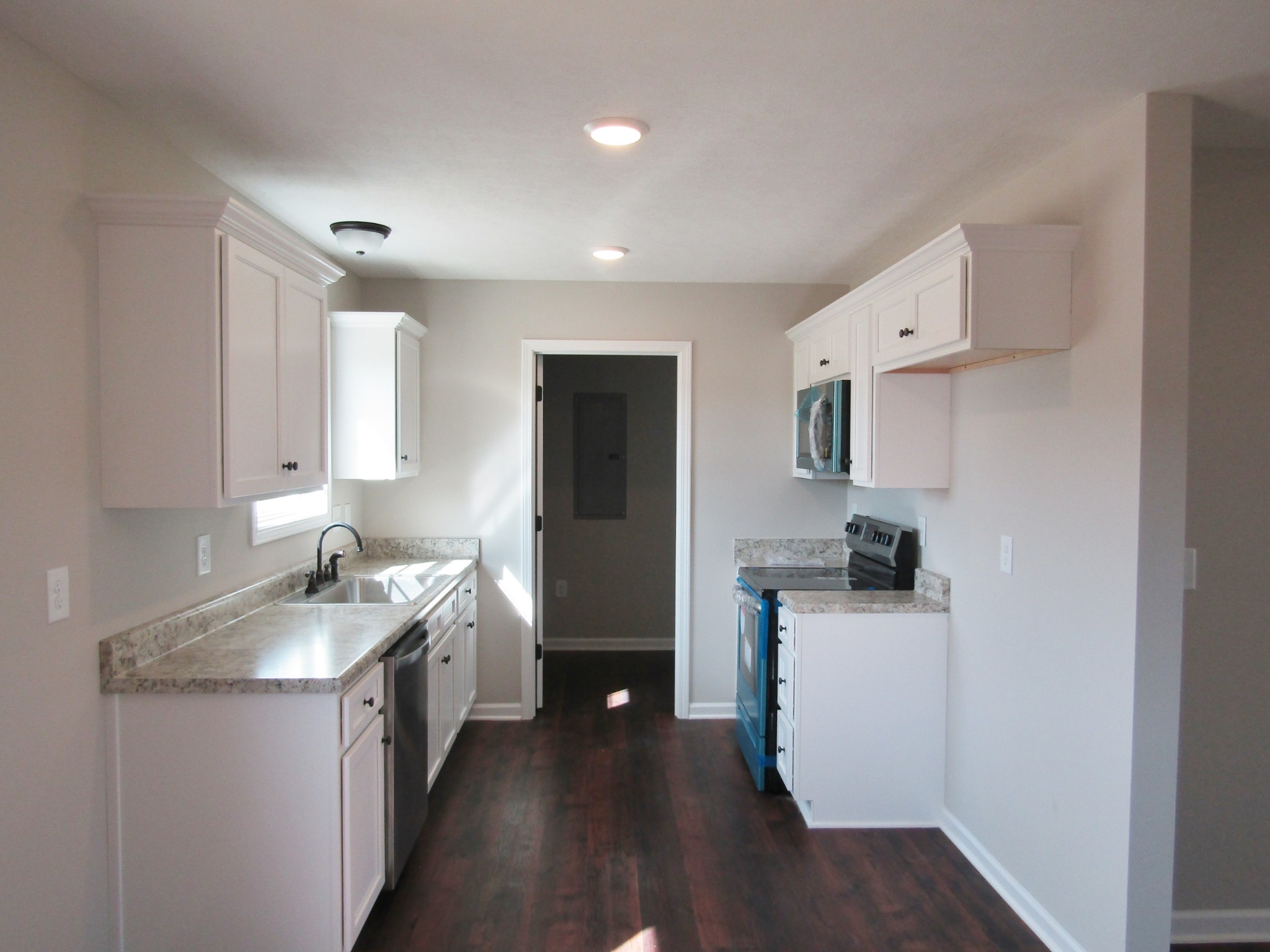 1719 Old Belfast Road Lewisburg, TN 37091 - Photo 5 of 14 a kitchen with a sink appliances and cabinets