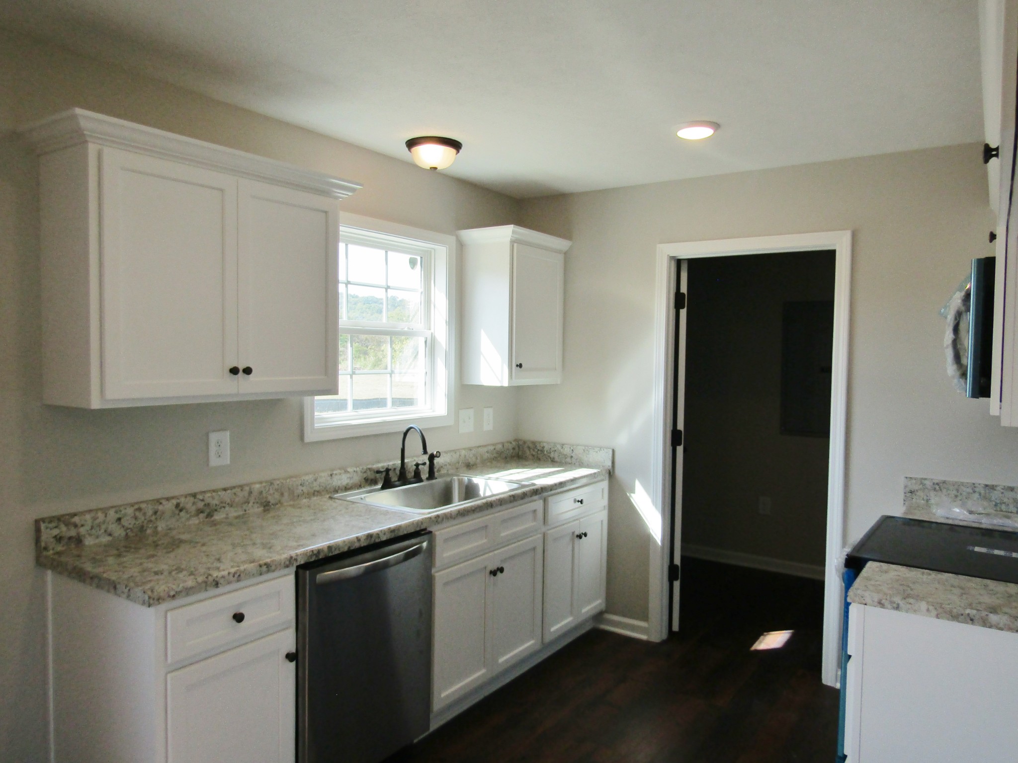 1719 Old Belfast Road Lewisburg, TN 37091 - Photo 6 of 14 a kitchen with a sink stove and cabinets