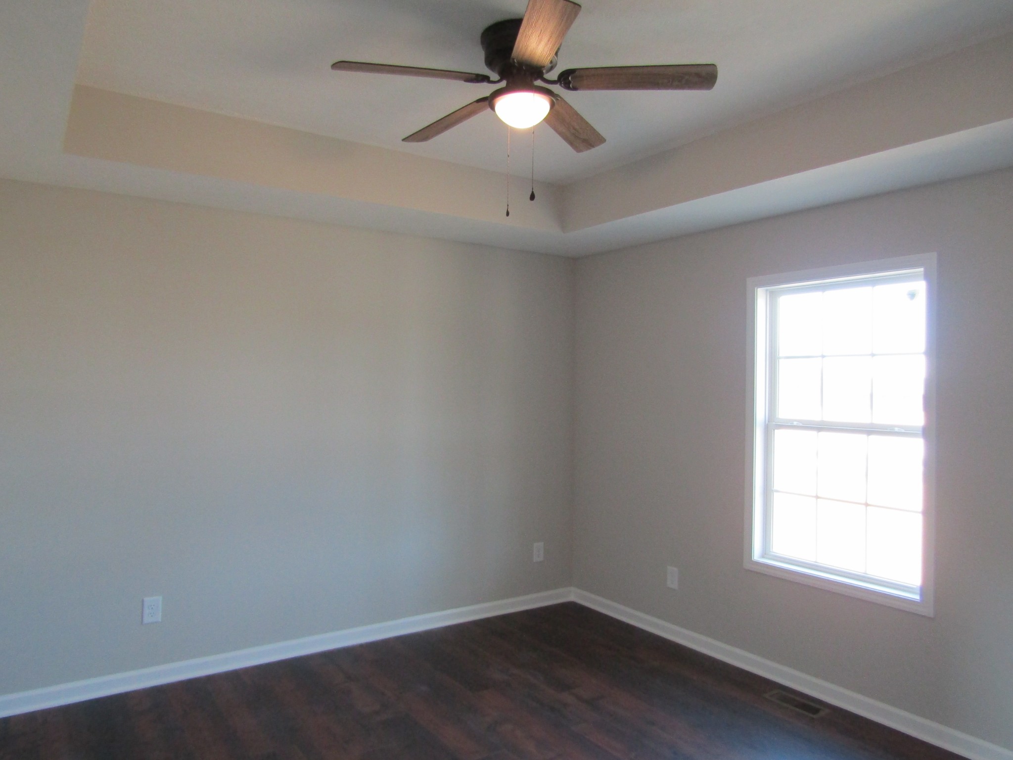1719 Old Belfast Road Lewisburg, TN 37091 - Photo 8 of 14 an empty room with a window and a fan