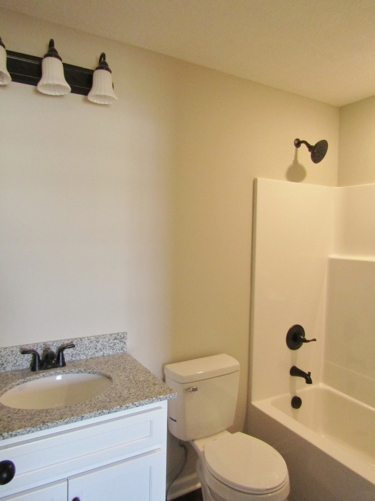 1719 Old Belfast Road Lewisburg, TN 37091 - Photo 10 of 14 a bathroom with a granite countertop toilet and a sink