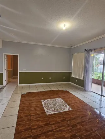 wooden view of room with window and wooden floor