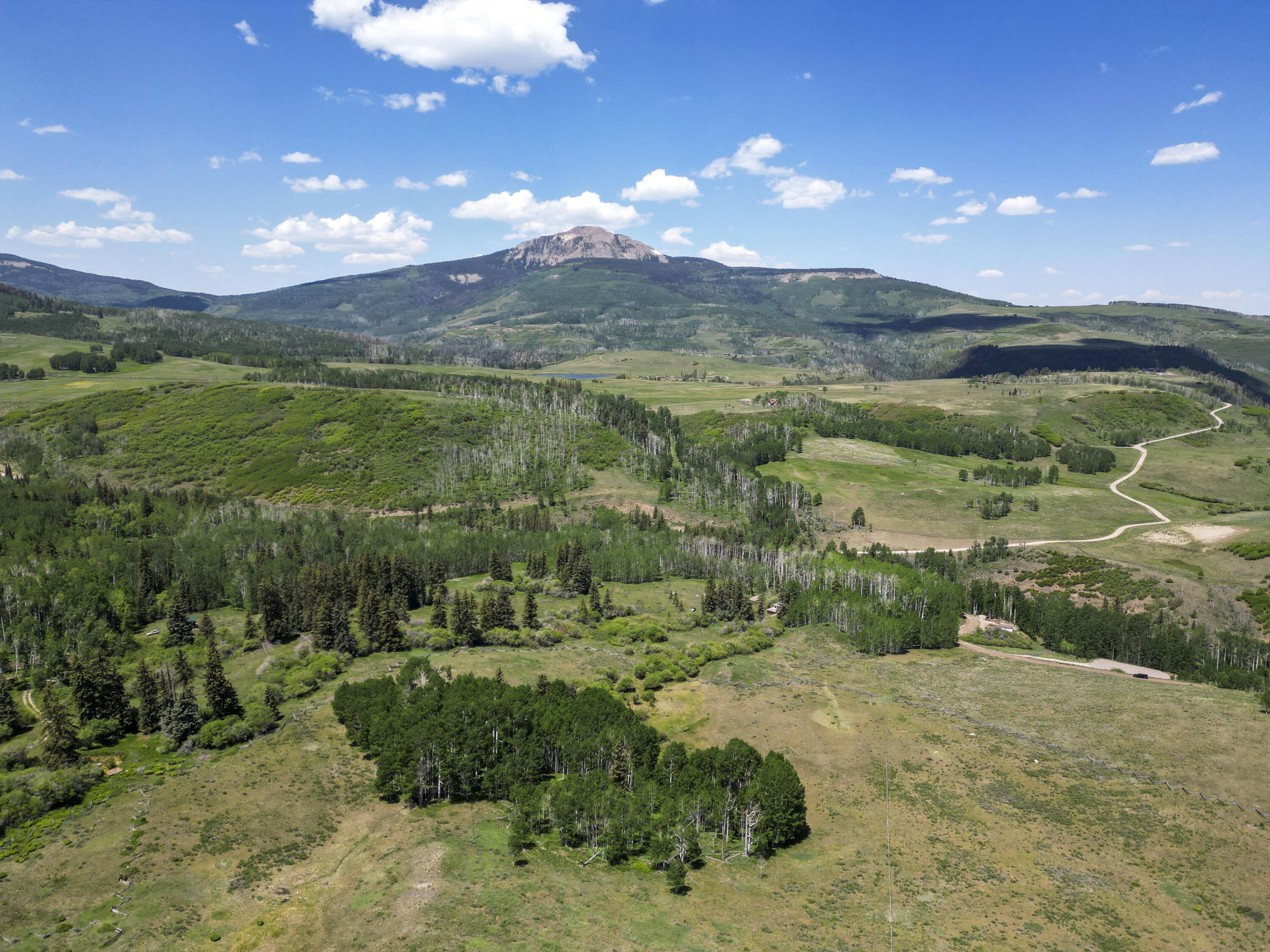 Tbd Wilson Mesa Ranch Circle Placerville, CO 81430 - Photo 8 of 9 a view of a lake with a mountain in the background
