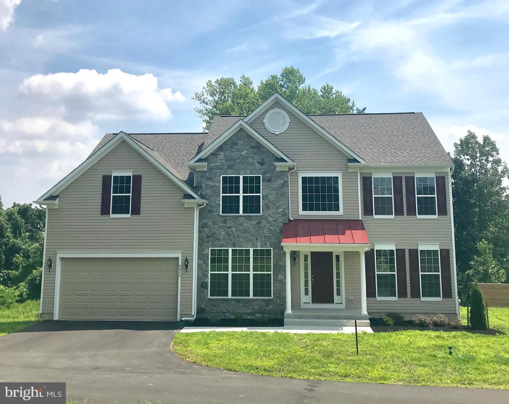 6020 Cypress Springs Road Elkridge, MD 21075 - Photo 1 of 29 a front view of a house with a yard