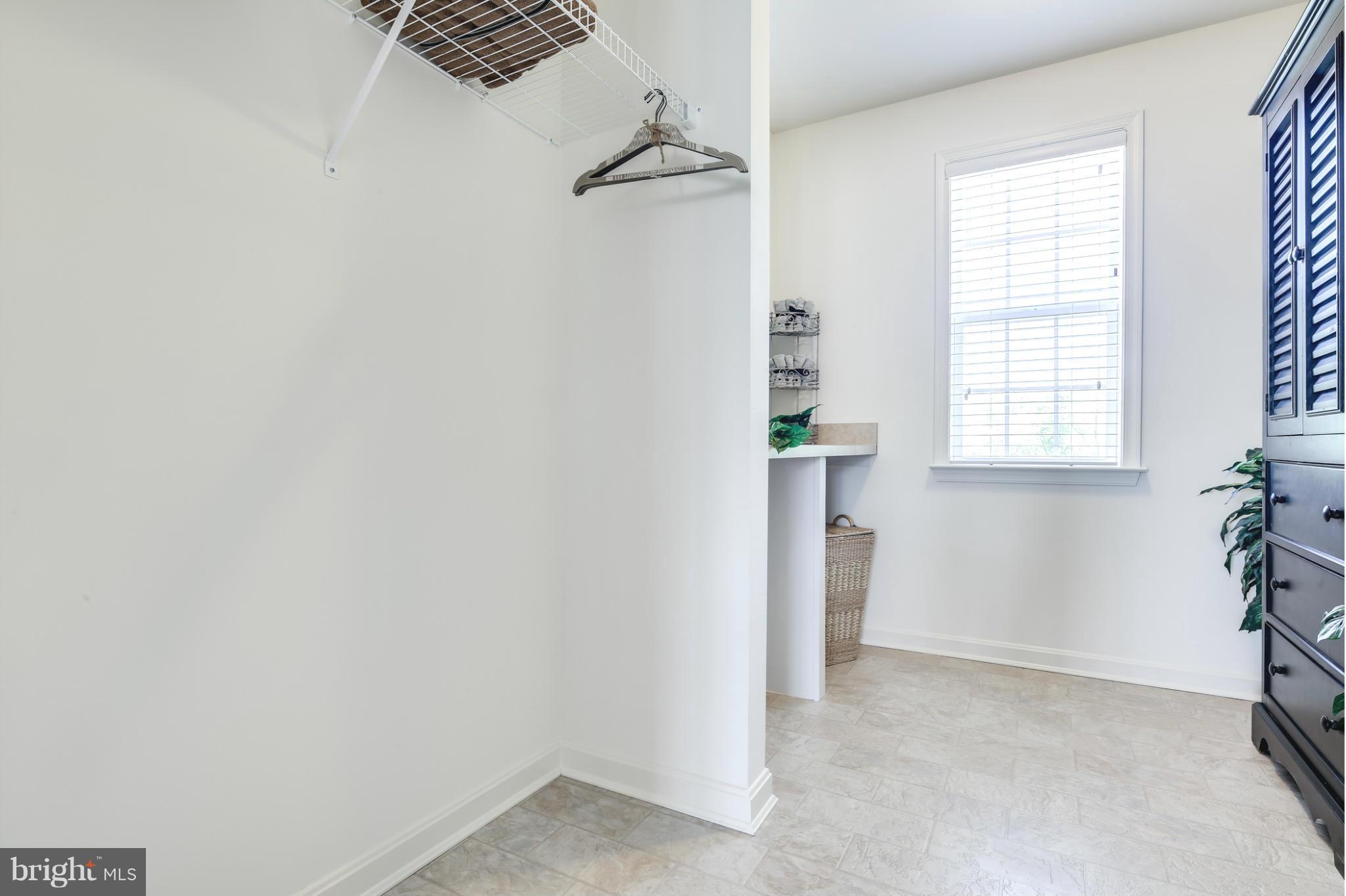 6020 Cypress Springs Road Elkridge, MD 21075 - Photo 27 of 29 an empty room with windows and closet