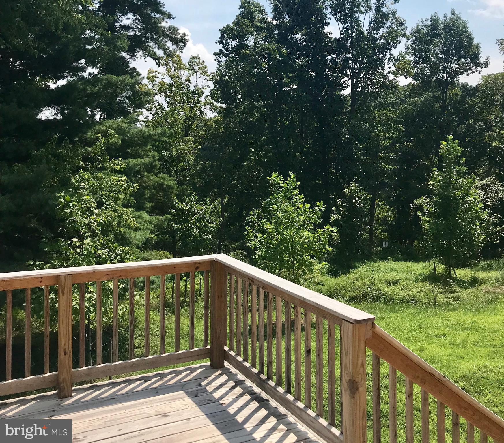 6020 Cypress Springs Road Elkridge, MD 21075 - Photo 10 of 29 a view of balcony with deck and yard