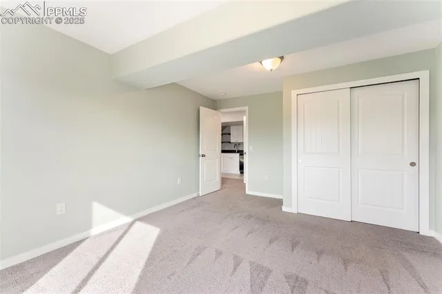 a view of a balcony with wooden floor
