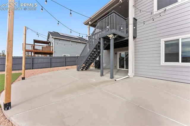 a view of a big house with a yard