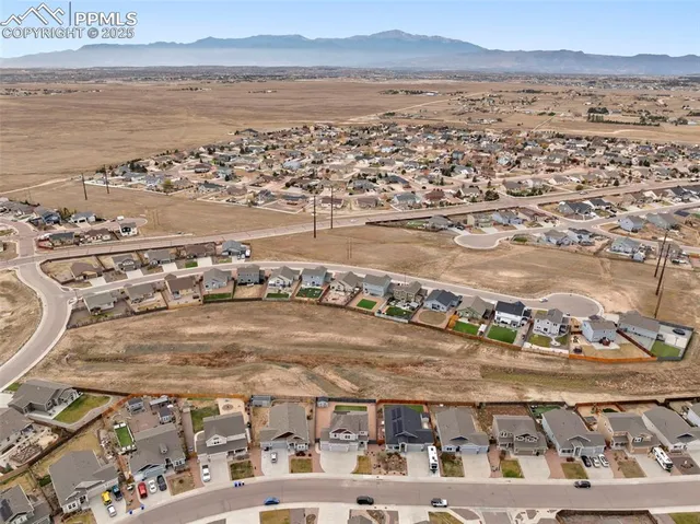 a view of a city with tall buildings in the background