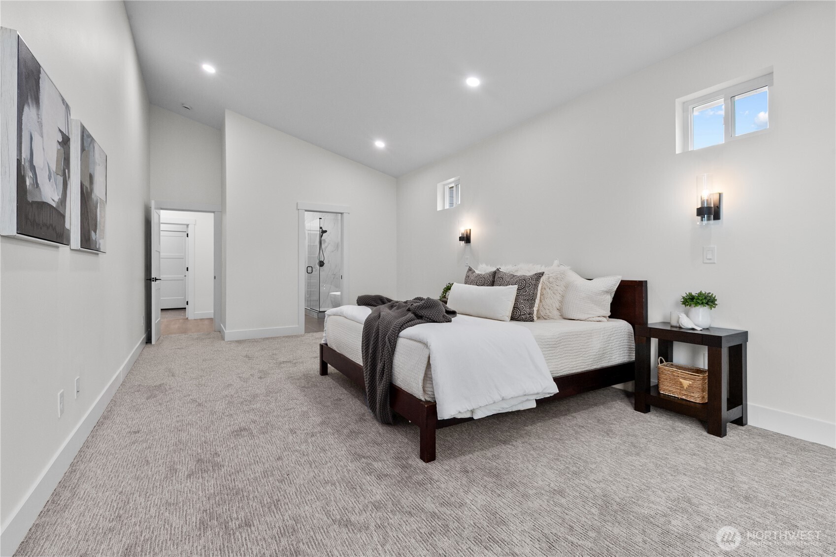 6917 Red Ridge Drive Lynden, WA 98264 - Photo 12 of 40 a spacious bedroom with a bed and a couch