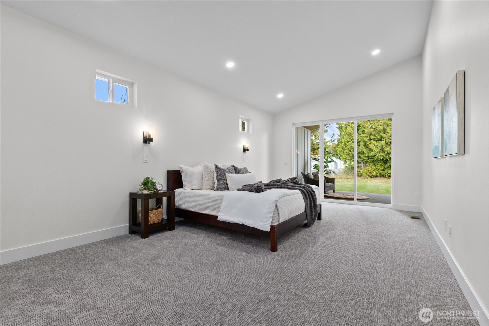 6917 Red Ridge Drive Lynden, WA 98264 - Photo 13 of 40 a spacious bedroom with a bed and a window