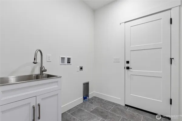 a bathroom with a sink and mirror