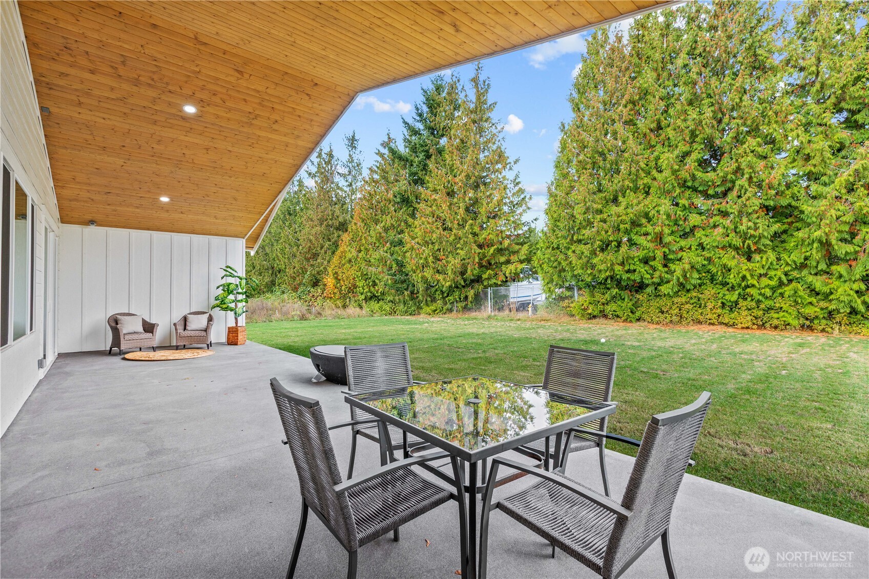 6917 Red Ridge Drive Lynden, WA 98264 - Photo 25 of 40 a view of yard with seating area and trees