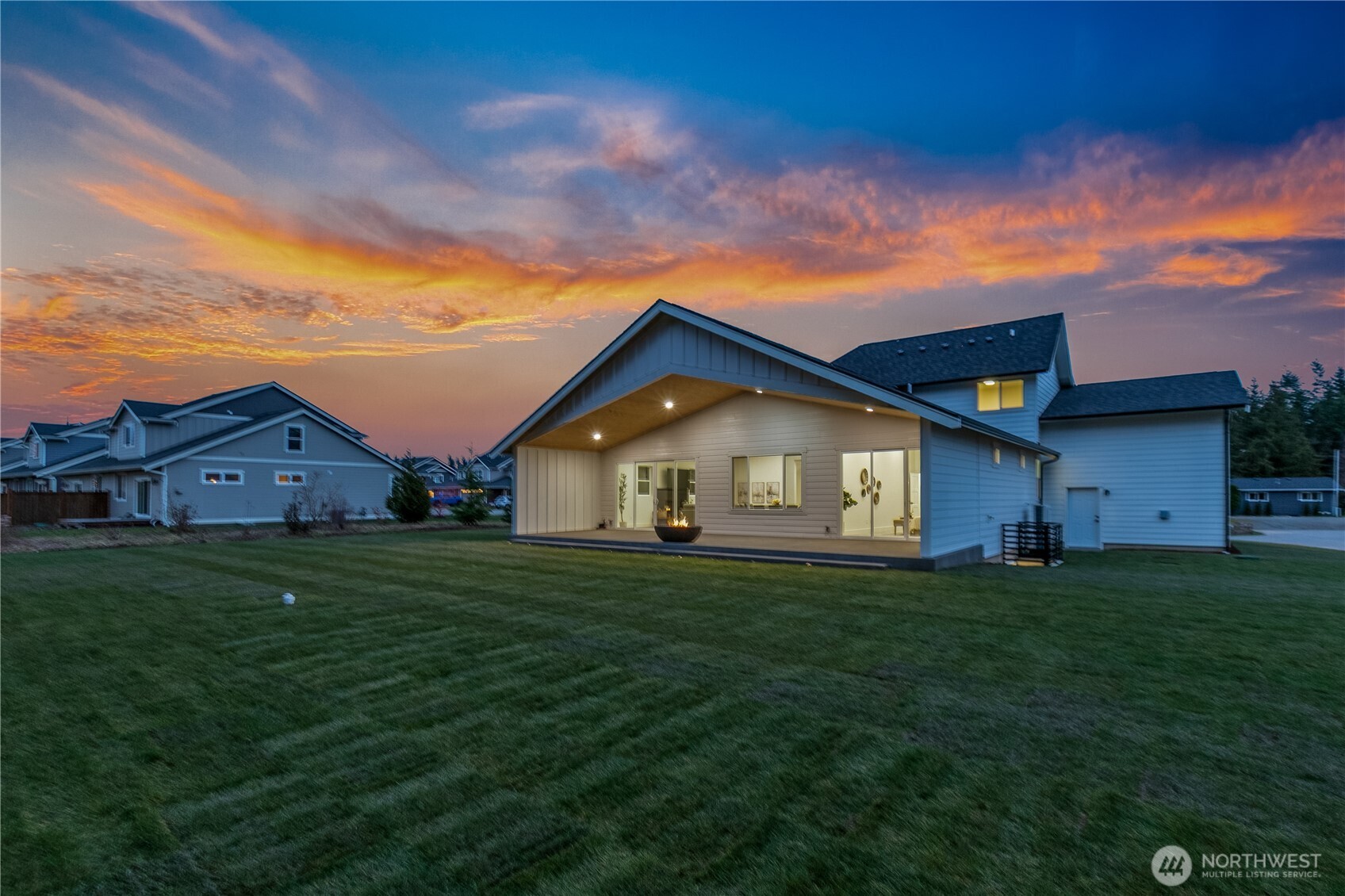 6917 Red Ridge Drive Lynden, WA 98264 - Photo 29 of 40 a view of a big house with a big yard and large trees