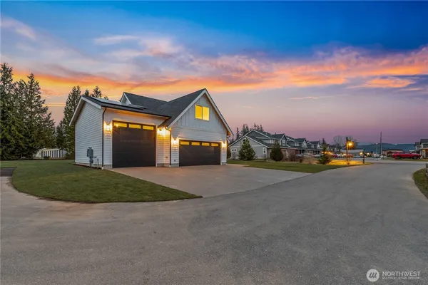 a view of a house with a big yard