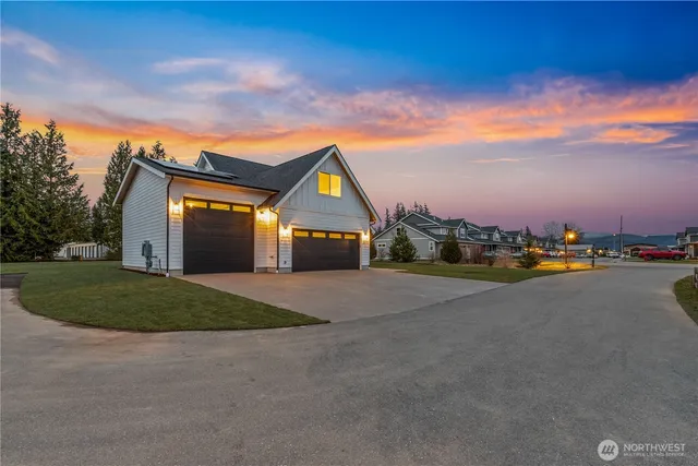 a view of a house with a big yard